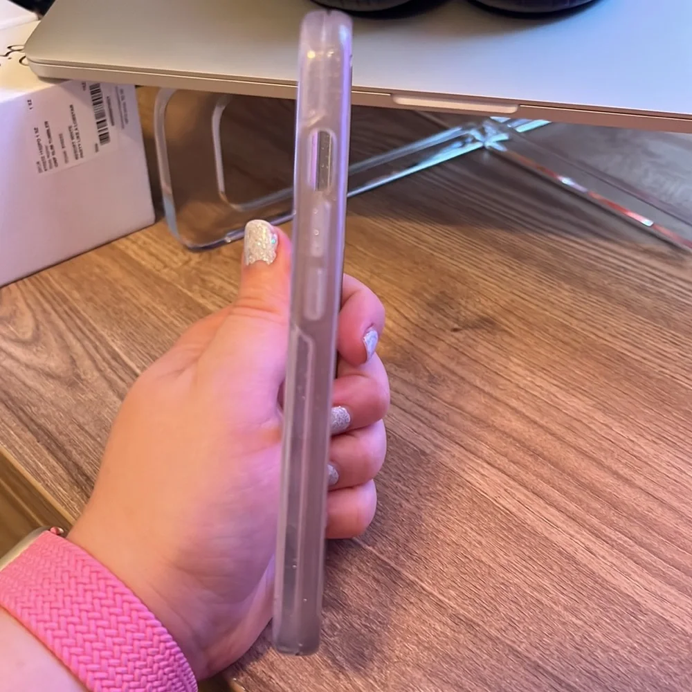 iPhone 13 Pro Otterbox with mag safe charging ring.